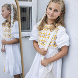 Teela White with Yellow Crochet Dress